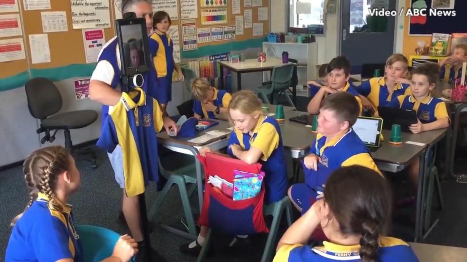  Amused children watch on in amazement as they see Brodie whizz around the classroom