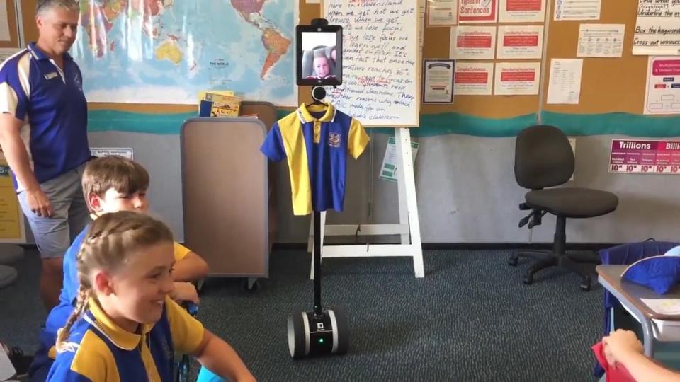  Brodie is using technology on wheels to interact with his classmates at school