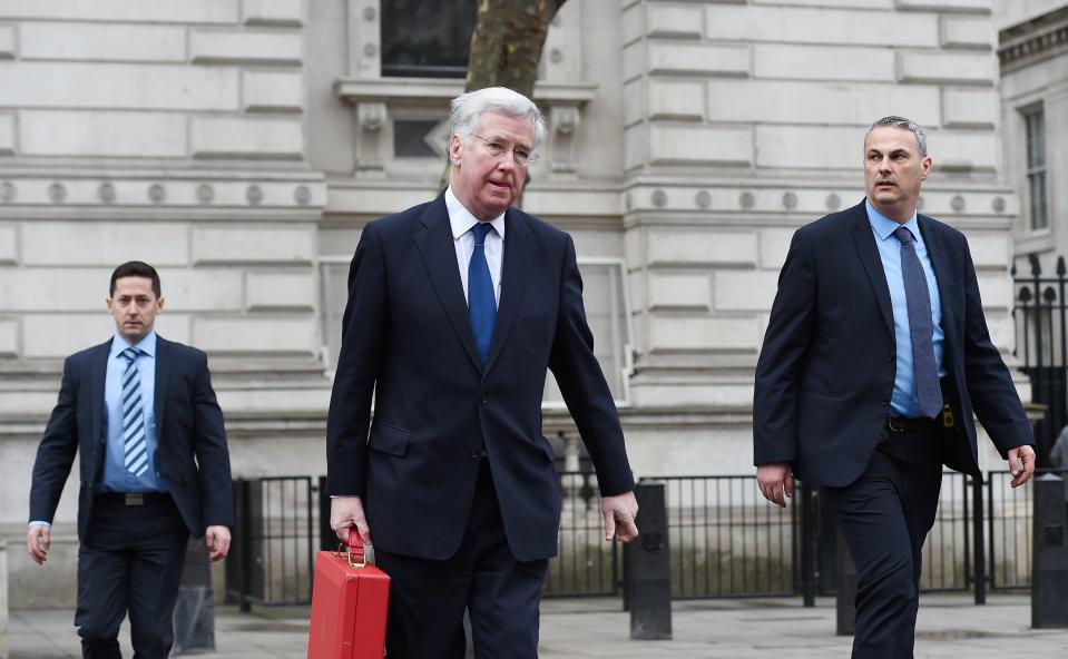 Defence Minister Michael Fallon leaves Downing Street following a briefing with Prime Minister Theresa May today
