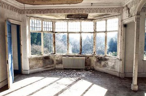  Room with big bay windows has been transformed into the school library