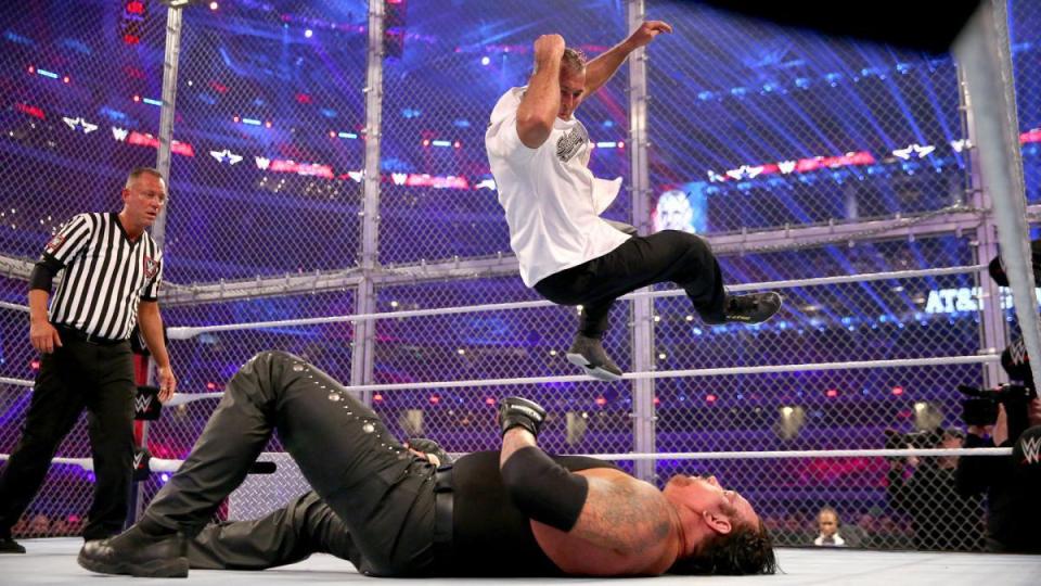 Shane McMahon drops an elbow on the Undertaker at last year's WrestleMania
