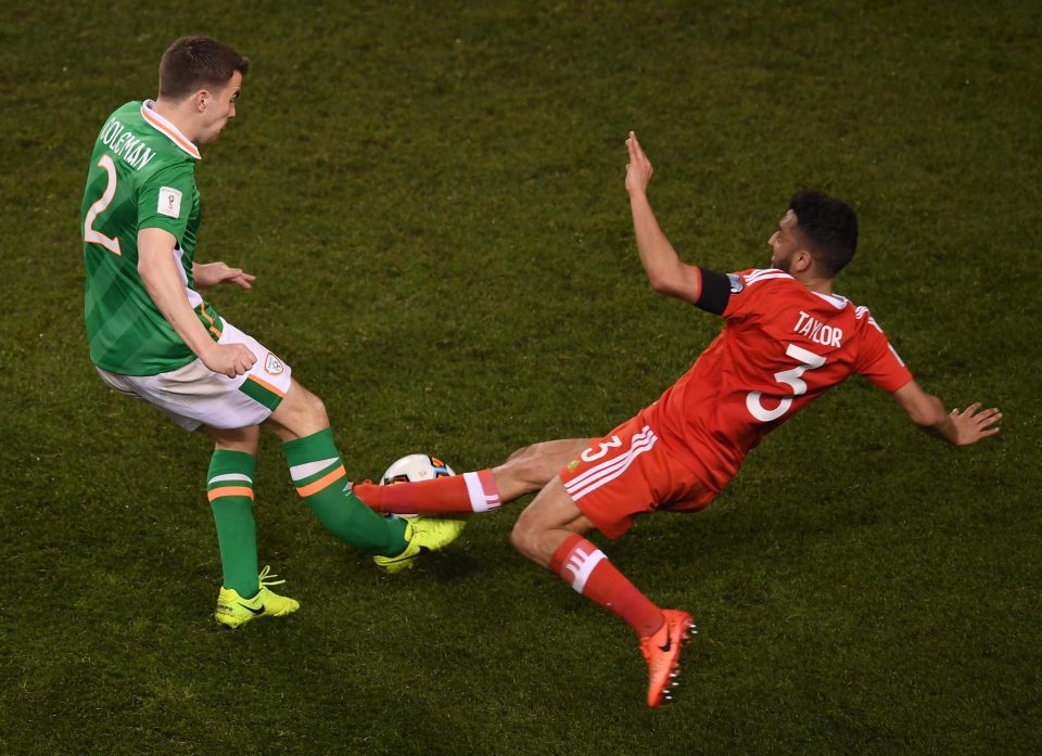 Neil Taylor slides in for this tackle with terrible results for Ireland defender Seamus Coleman