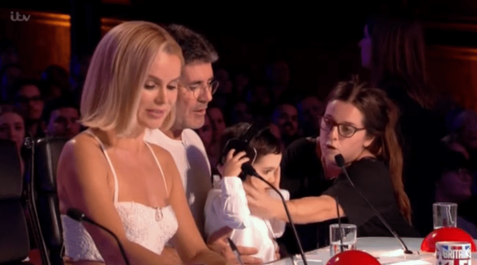  Eric's dad made sure that he had headphones on before he pressed the buzzer