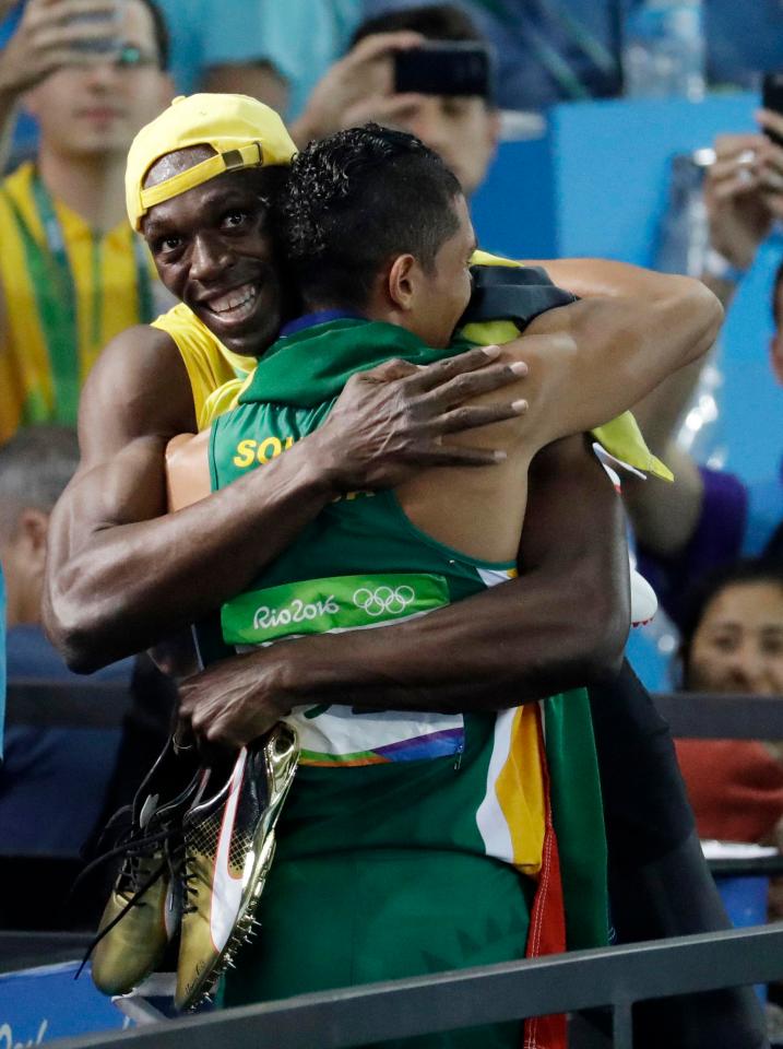 Usain Bolt embraces South Africa's Wayde Van Niekerk after his record-breaking Olympic display