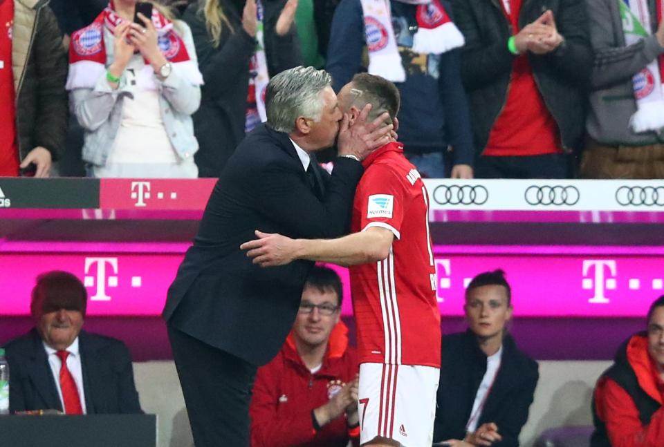 But Ancelotti instantly planted a smacker on Ribery's cheek to calm him down