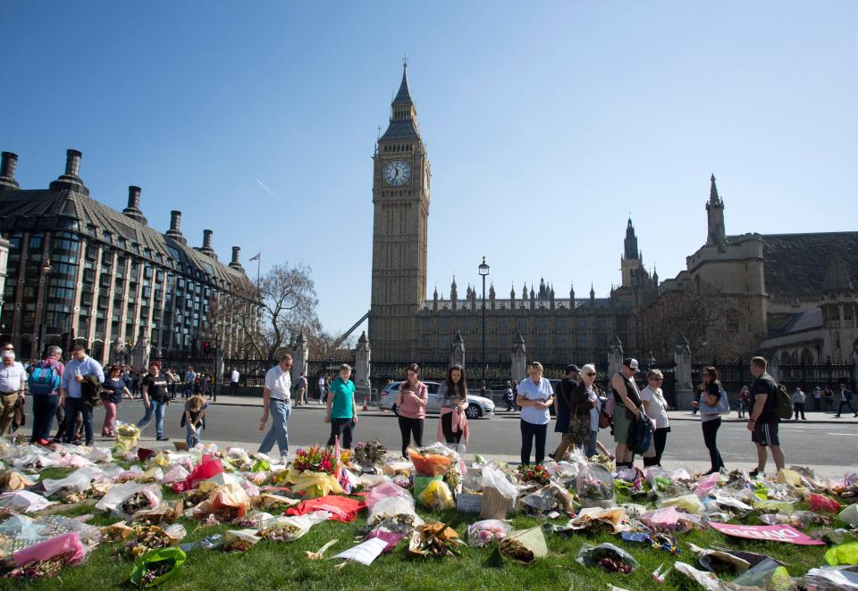  Dozens of flowers were left outside the Carriage gate at the Houses of Parliament ahead of the funeral