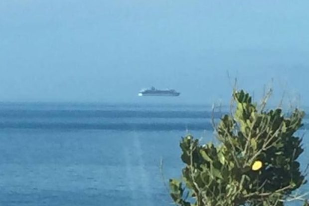 A picture of a cruise liner that looks like it was floating in mid-air has become an internet sensation
