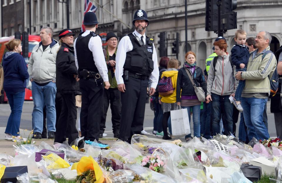  Well-wishers and mourners have left flowers as they pay their respects to PC Palmer