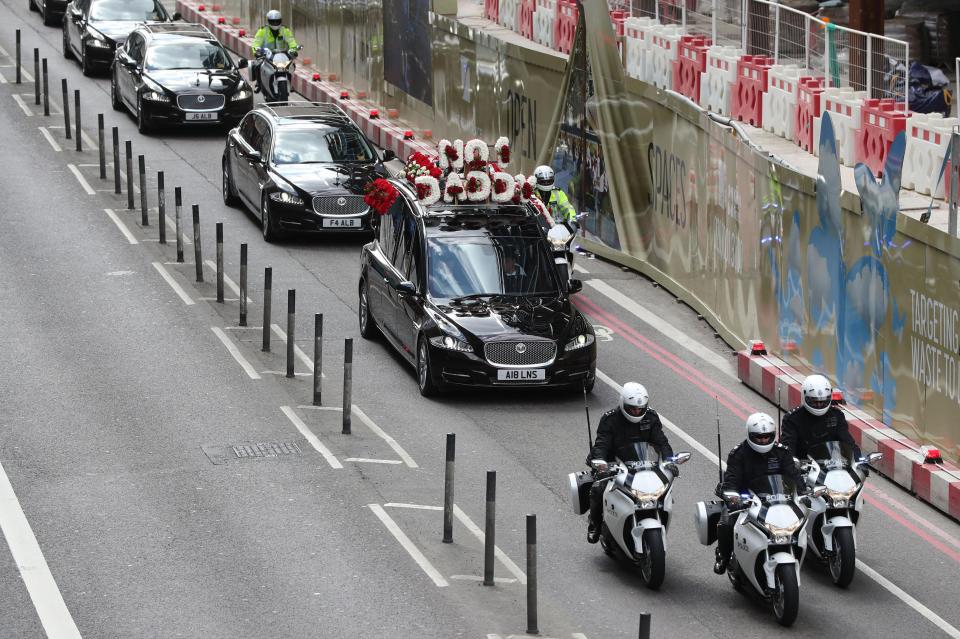  Police flanked the hearse as members of PC Palmer's family were believed to be in black people carriers travelling behind