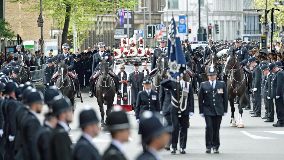  Officers on horseback escorted the hearse carrying PC Palmer's body through to Southwark Cathedral