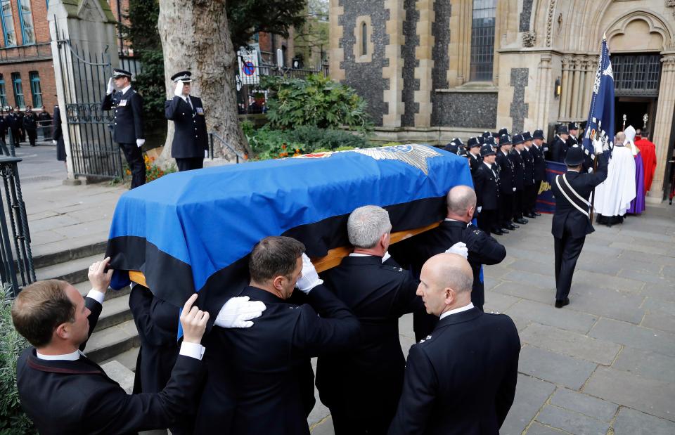 PC Palmer's coffin was draped in a blue cloth with the Metropolitan Police emblem on it