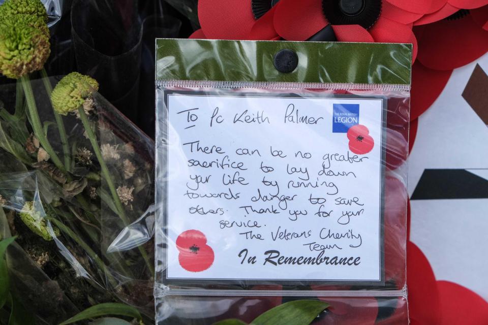  A poignant message left on note with flowers in tribute to PC Palmer