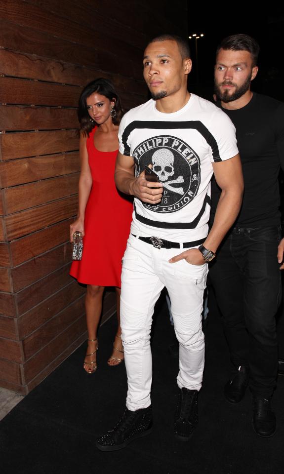  The fitness enthusiast, 25, looked sensational in a knee-length red dress and strappy metallic heels as she arrived beside the sportsman, 27, at 1 OAK