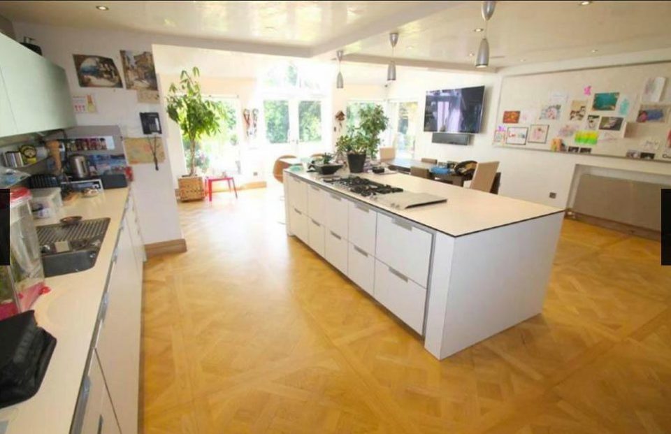The roomy kitchen with floor to ceiling windows inside David De Gea's mansion