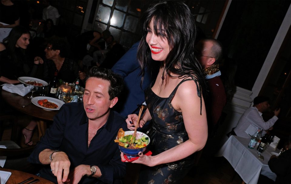  Nick Grimshaw and Daisy Lowe share a laugh over some food