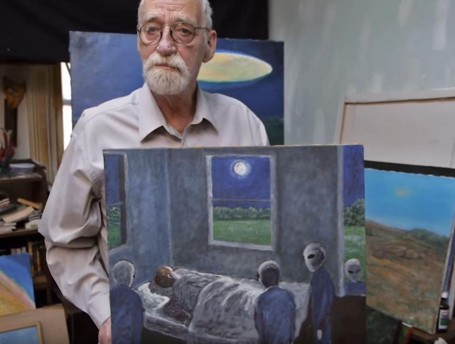  Huggins presents one of his alien-inspired works of art in documentary Love and Saucers