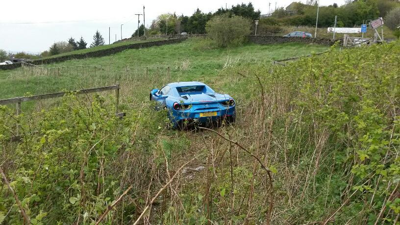The damage done to the sports car is extensive and it may be a write-off