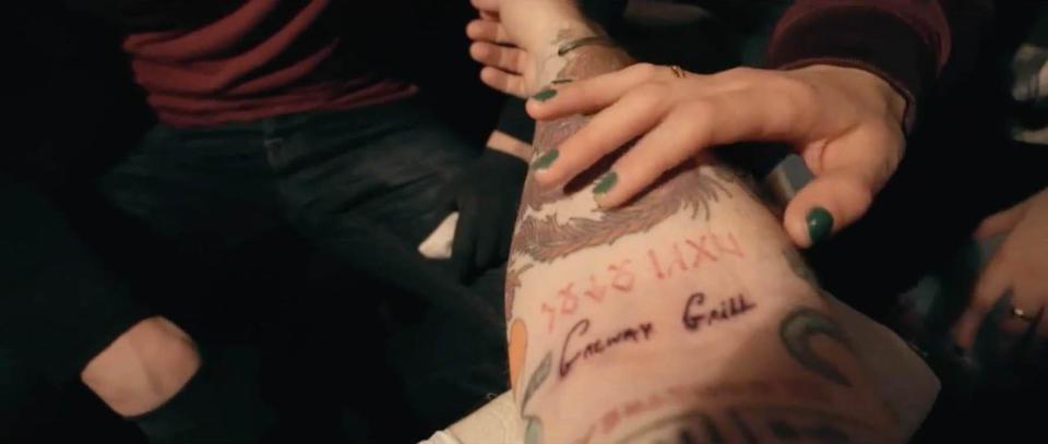  The pair pay a visit to an after hours tattooist who inks 'Galway Grill' on to Ed's arm
