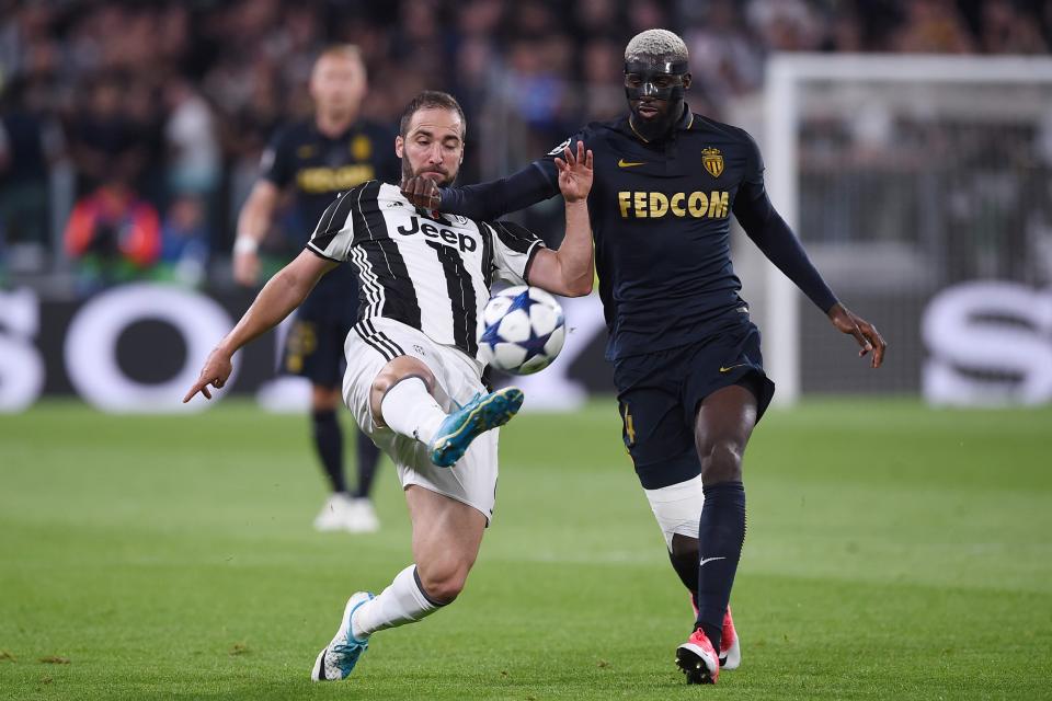 Monacos Tiemoue Bakayoko tussles with Juventus star Gonzalo Higuain