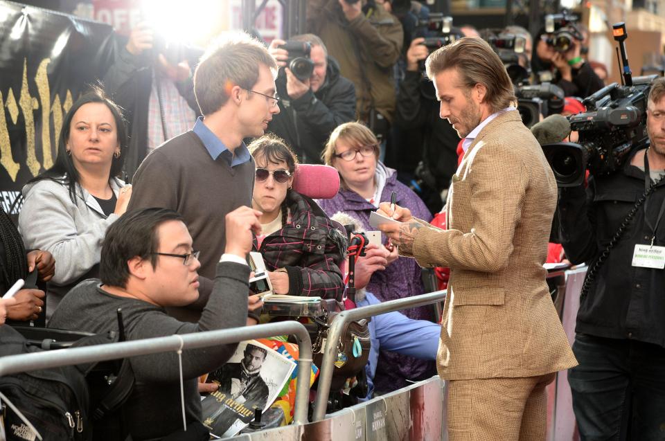 Becks spent time chatting to fans and signing autographs
