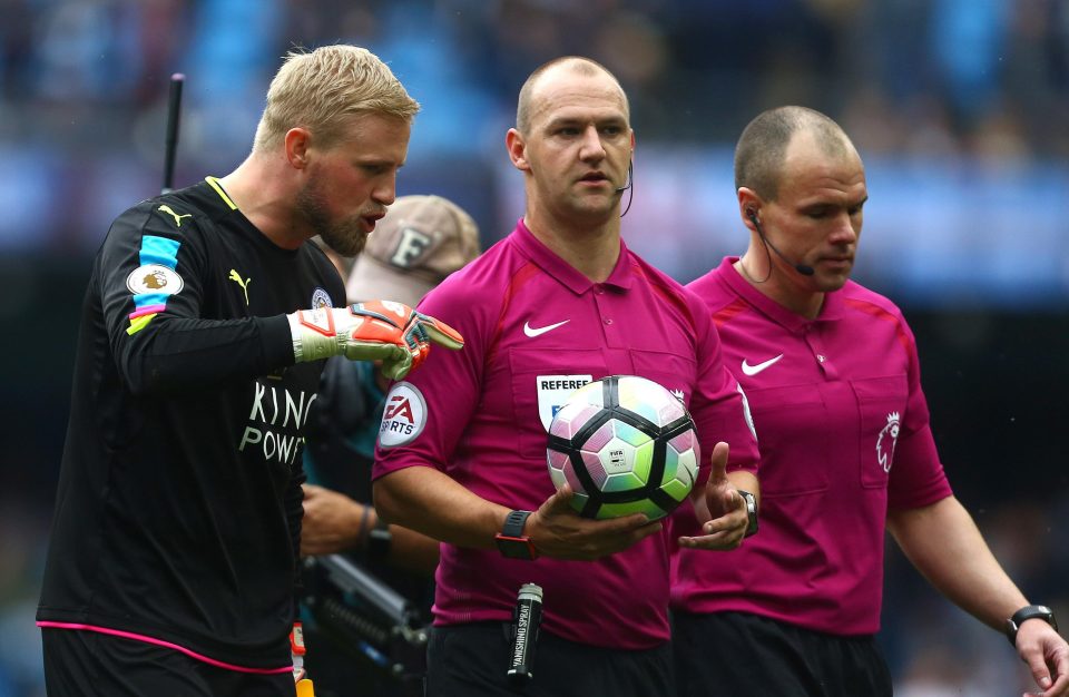 Kasper Schmeichel protests to Craig Pawson about David Silva's goal