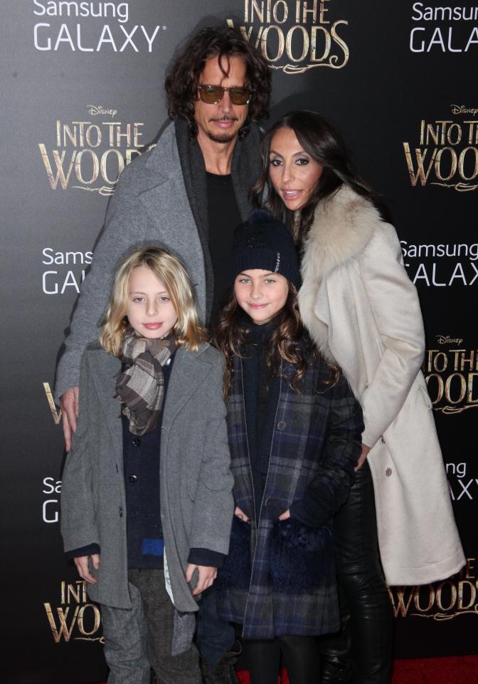 Chris Cornell, Soundgarden and Audiosalve frontman has died aged 52, here he is seen pictured with his wife Vicky Karayiannis and his kids Toni and Lillian Jean Cornell