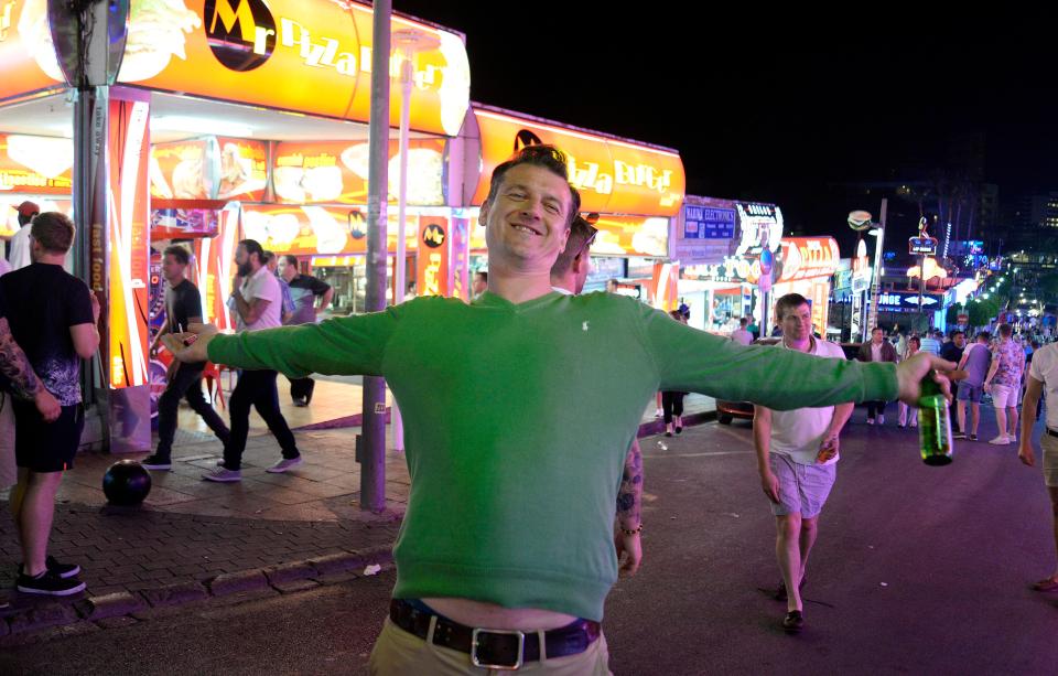  This man looks thrilled to be out on the town as he poses for the camera ahead of a boozy night