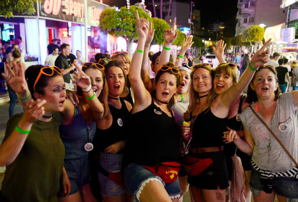  A group of women with matching sunglasses hit the town looking excited for the night out ahead