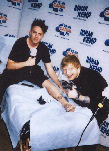  The 24-year-old bravely had his leg inked by the musician live on his evening radio show