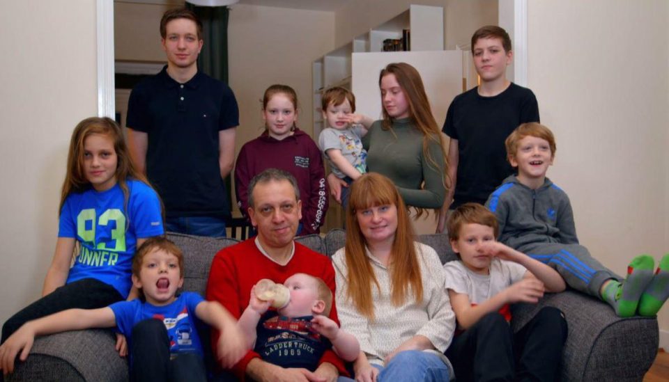  Mark and Tania Wilkinson have 13 children (not all pictured) ranging from a baby to their twenties