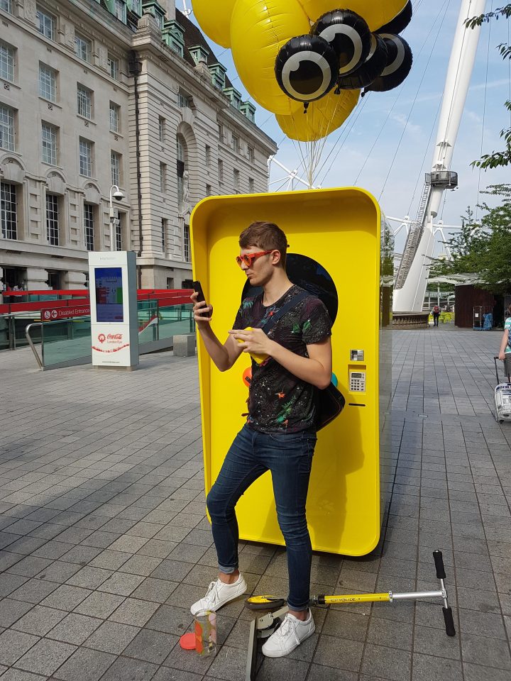 Phillip bought a coral pair of Spectacles and took some time to take a selfie before scooting back to the office