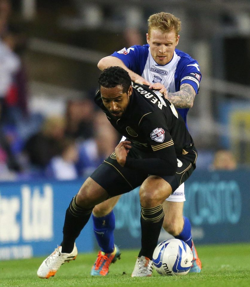  Jean Beausejour, in black kit, playing for Wigan
