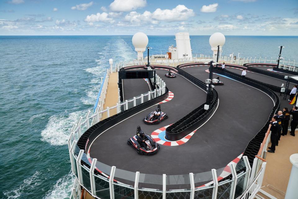 The Norwegian Joy is so fancy that it has its own two-storey go kart track on the desk of the cruise ship 