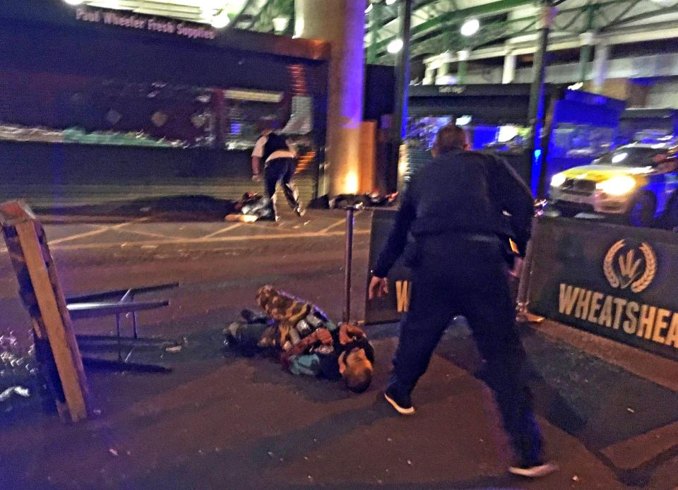 Ringleader Abz from East London lies dying on the floor following hail of police bullets