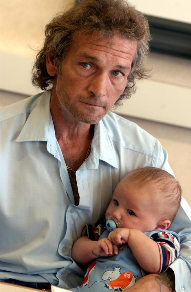  Natalie's father David Putt cares for baby Rhys at the time of his mother's disappearance