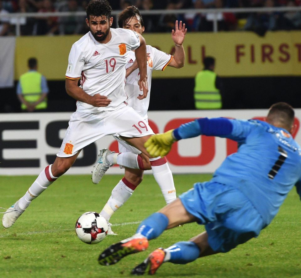 Diego Costa strokes home Spain's second goal