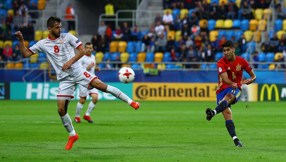 Marco Asensio went on to claim the matchball as his side proved too much for Macedonia