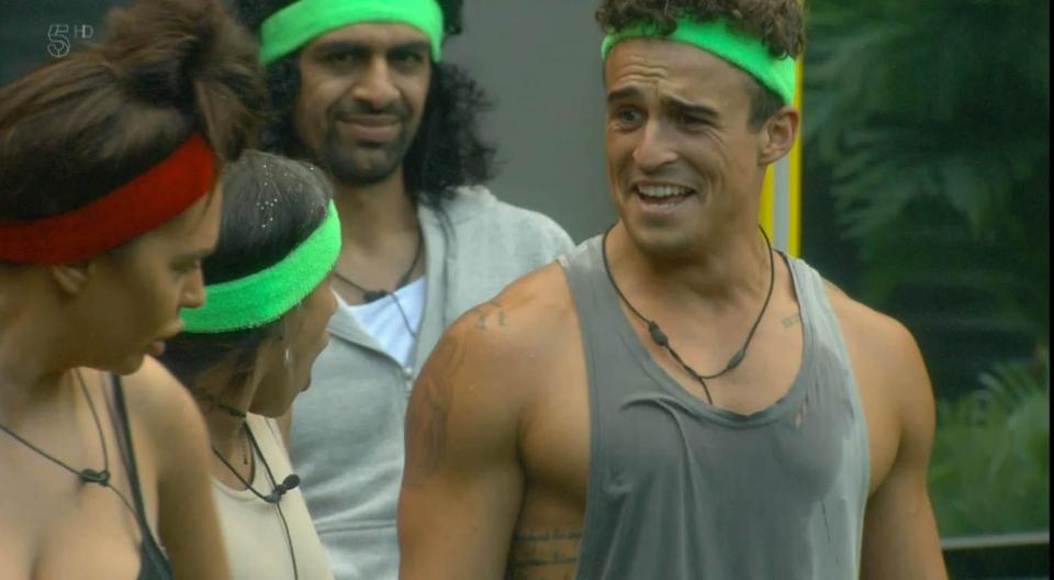  Lotan later covered up in a baggy grey vest