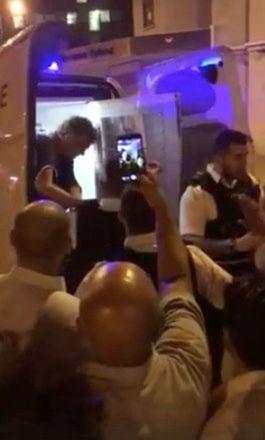  The suspect blew a kiss from the back of the police van after the shocking terrorist incident