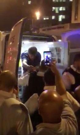  Officers put a man in the back of a police van after a vehicle collided with pedestrians in Finsbury Park