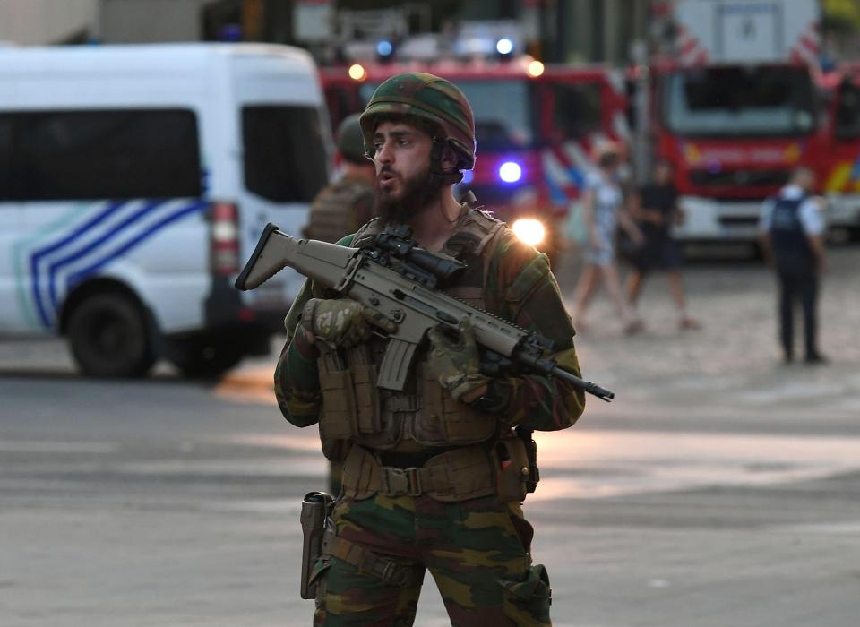 Armed police guarded the station in the Belgian capital following the terror attack