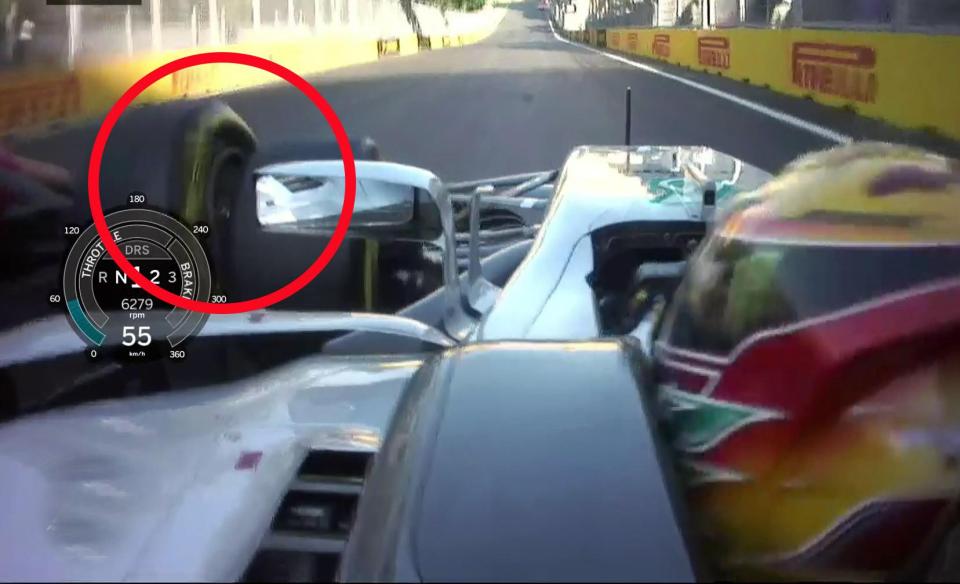 The view from Hamilton's car as the Ferrari of Vettel collides with the front left wheel