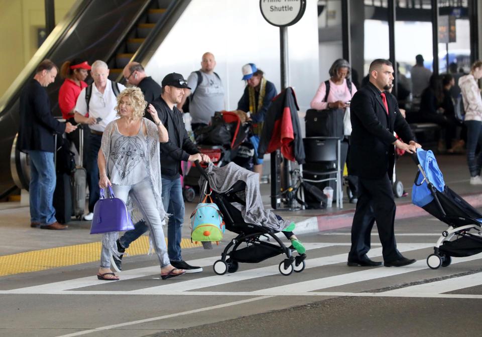  Michael Buble is seen with his family in public earlier this week for the first time since his son's cancer diagnosis