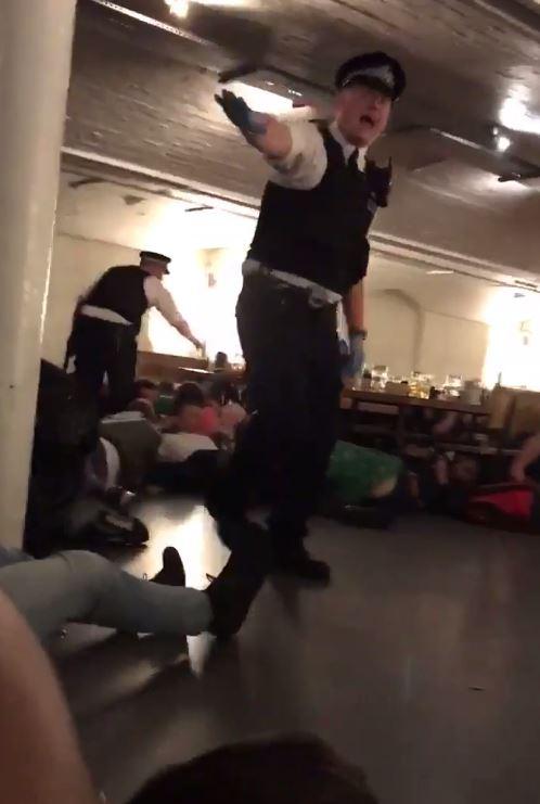  An officer screams at punters to keep down