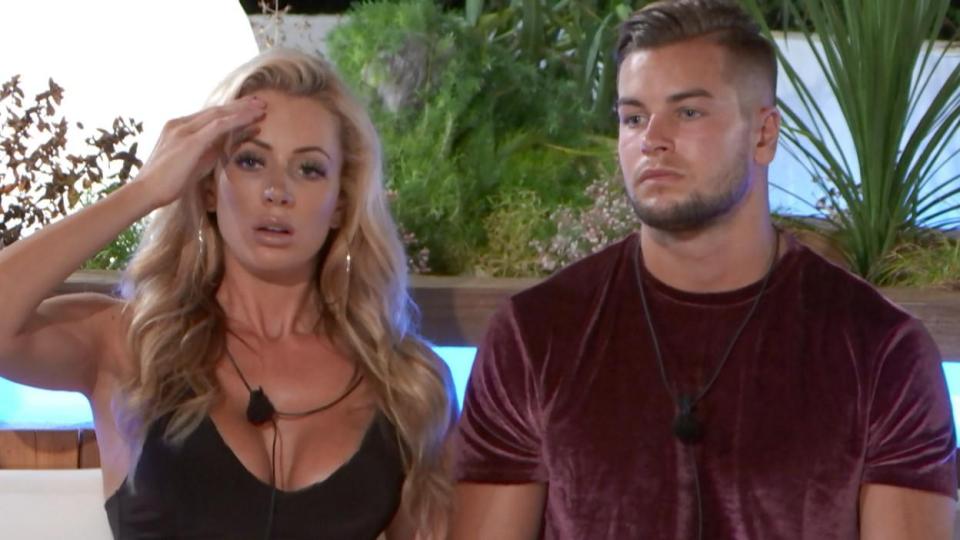 Olivia makes sure Mike knows she's single after splitting from Chris 