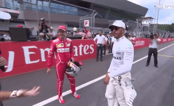  The McLaren driver and Ferrari racer did not appear too happy to be together