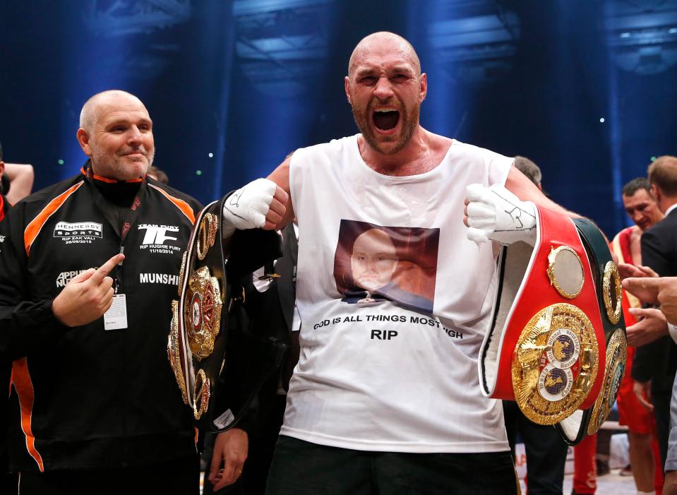  Peter Fury with Tyson after his win over Wladimir Klitschko