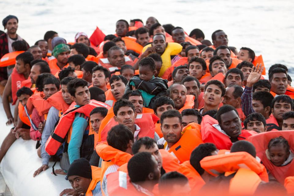  Red Cross workers rescue migrants from International waters between Libya and Italy