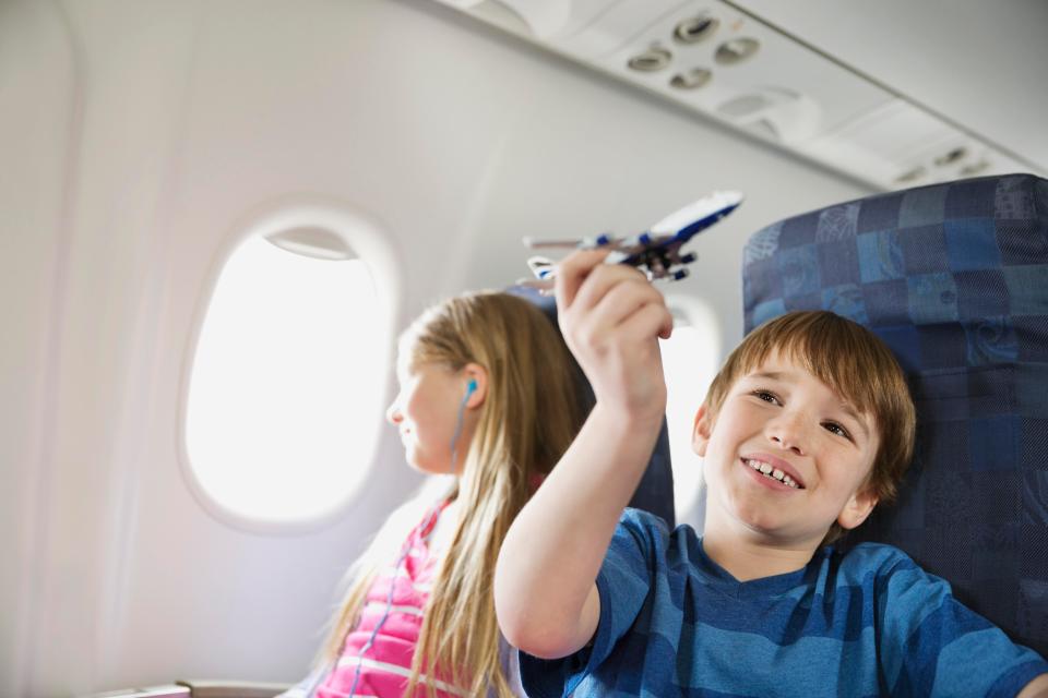 There are a number of tricks that parents can use to keep children happy on flights 