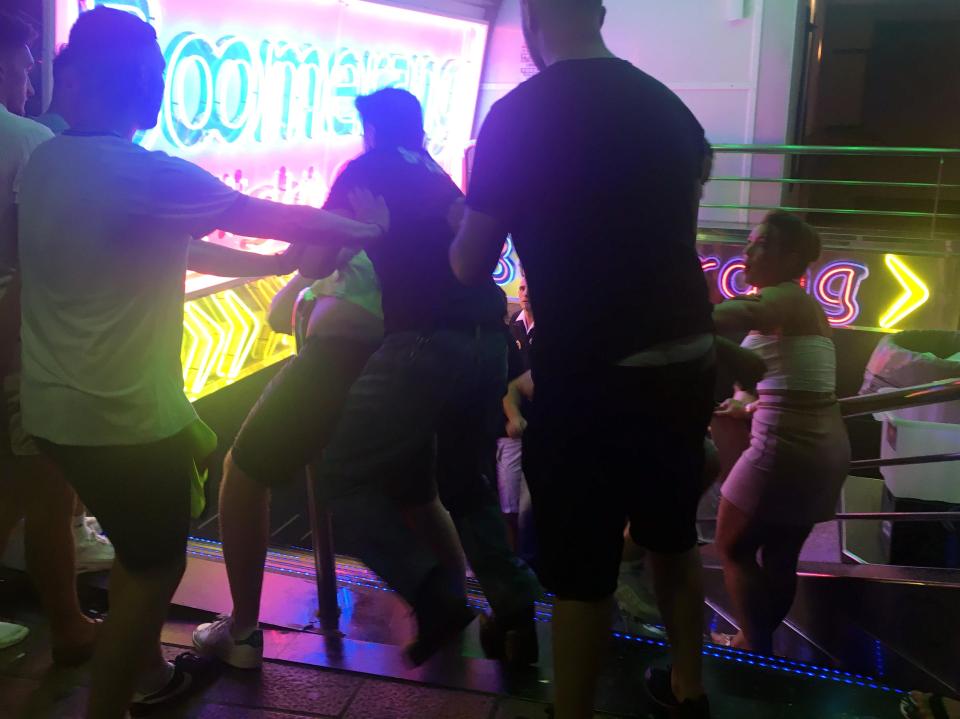 Bouncers and drunk Brits attack one another outside Boomerang Club
